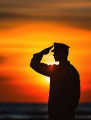 Soldier saluting at sunset on beach.