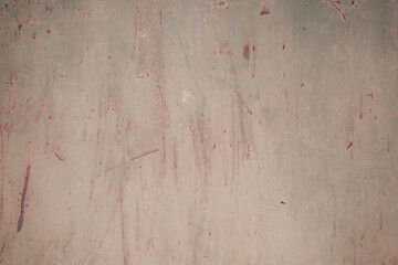 Fragment of a rusty grunge surface. Orange-green background color. Scuffs and peeling of old paint....