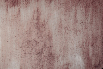 Fragment of a rusty grunge surface. Orange-brown background color. Scuffs and peeling of old paint....