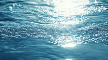 Obraz premium Close-Up of Rippling Water with Glimmering Sunlight