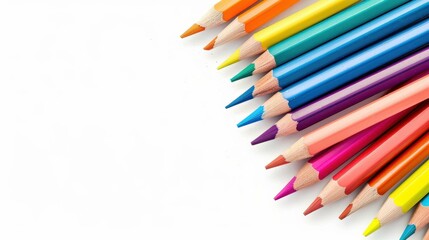 Fototapeta premium Vibrant colored pencils create a stunning border on white, perfect for your creative projects and artistic expressions.
