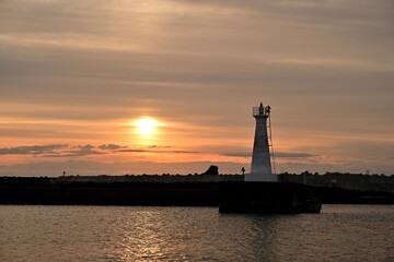 sunrise at a fishery harbor