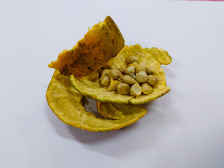 Orange peel and orange seeds isolated on white background