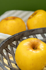 Vertical image of apples in the kitchen.