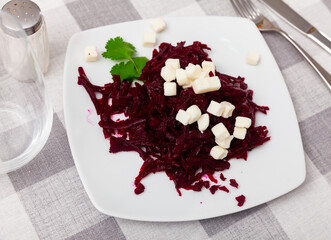 Healthy and easy-to-prepare appetizer for meat dishes is salad of stewed grated beetroot, seasoned...