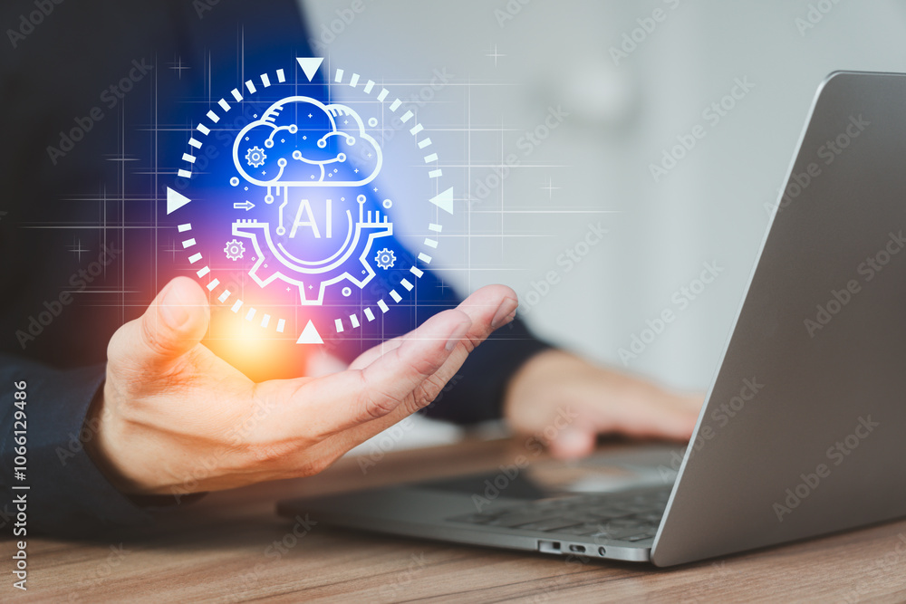 Poster businessman holds a virtual ai interface symbol hovering above his hand with a laptop, symbolizing a