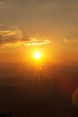 Vertical Horizon Sunset mountain range beautiful landscape mist foggy sunrise beam. Golden sky Mountain landscape mountain. Vertical Amazing Landscape cloud sky on sunrise. Gold sunlight heaven scene