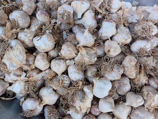 Top view Garlic background on market stand.
