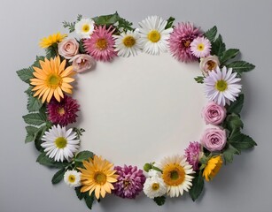 Obraz premium Round frame of daisies and roses on white.