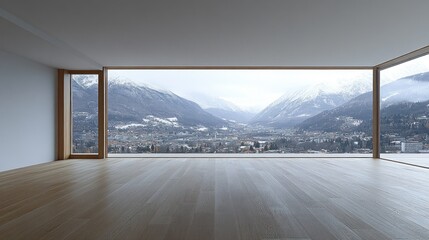 Fototapeta premium Empty room with large windows overlooking a snowy mountain valley.