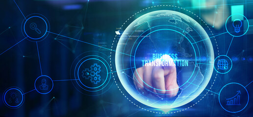 Fototapeta premium Business, technology, internet and network concept. Virtual screen of the future and sees the inscription: Business transformation.