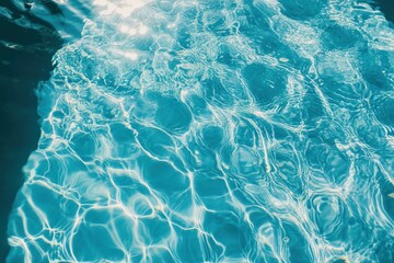 Fototapeta premium Water in swimming pool with ripples and reflections