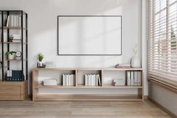 A contemporary minimalist living room features a wooden bookcase and a picture frame on the wall.