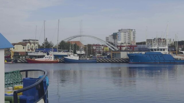 New Harbor bridge in Kolberg in Poland from the Baltic Sea (Full Shot Over shoulder )