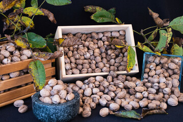 Display of walnuts inside the boxes and its against black background to showcases its details