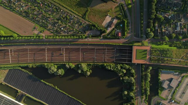 Locomotives Over Railroads Of Train Station in Barendrecht, Netherlands. Aerial Topdown Shot