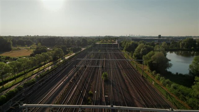 Fly Over Multi-Railroad Of Barendrecht Train Station In South Holland, Netherlands. Aerial Drone Shot
