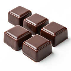 The nut chocolate,Directly above shot of cherries in box against white background,Pile of chocolate square candies with cocoa filling isolated on a white background.