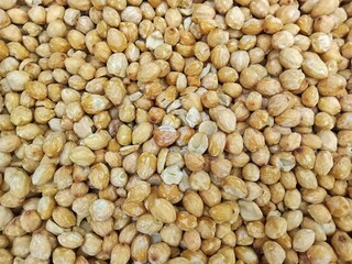 Horizontal photo of a group of whole candlenuts for the background