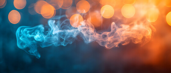 Obraz premium Abstract smoke trails with a blend of blue and orange tones against a soft bokeh background.