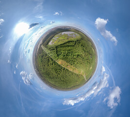 Big lake with green shores in bright sun light, aerial landscape. Recreation concept. Aerial view....