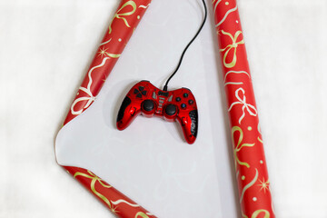 Video game controller for christmas gift package wrapping