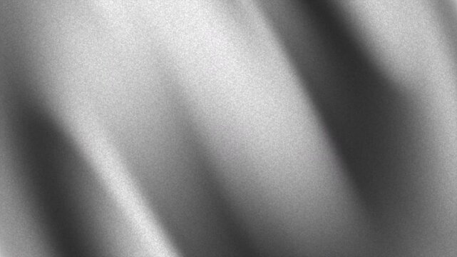 Black, grey and white grainy gradient noise texture background