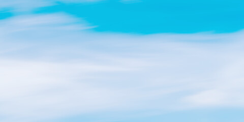 Obraz premium Natural motion blur background. sky scenery or environment. blurry blue sky and clouds