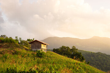 A small house on the top of a hill in Khun Pae Village, Chom Thong District, Chiang Mai Province.