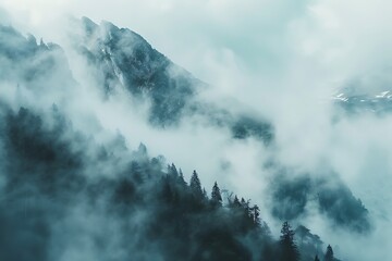 Obraz premium Mountain landscape with fog and clouds