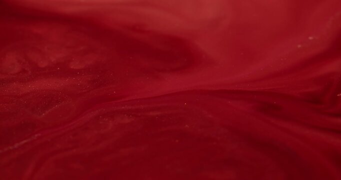 Wavy paint. Acrylic spill. Red art liquid mix with stone texture metamorphoses of enamel melted structure. Glitter expansion grunge with smooth leak.