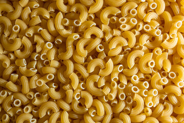 Uncooked Chifferi Rigati Pasta: A Culinary Canvas of Chifferi Rigati, Creating a Lively and Textured Background for Gourmet Cooking. Dry Pasta. Raw Macaroni - Top View, Flat Lay