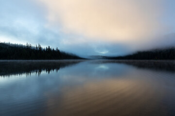 Beautiful misty fall weather, autumn vibes at Lost Lake in Oregon, near Hood River and Mount Hood, captured during early morning. Mystic fall vibes and scenery. 