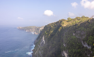 Cliffside near Kelingking Beach, a famous location on Nusa Penida island, Indonesia.