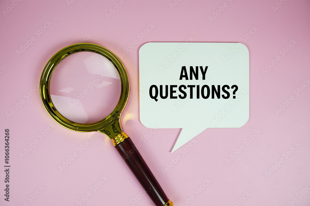 Poster any questions? text on speech bubble with magnifying glass top view on pink background