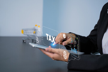 Busines using a Phone  to complete Individual income tax return form online for tax payment. Making financial plans. Banking and finance, investment, financial trading, mobile ,banking concept.