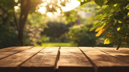Fototapeta premium Wooden tabletop with a blurred natural garden background ideal for showcasing products High quality image