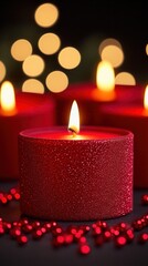 Close-up of a festive red candle with a warm flame and bokeh lights, ideal for holiday celebrations and cozy atmospheres.
