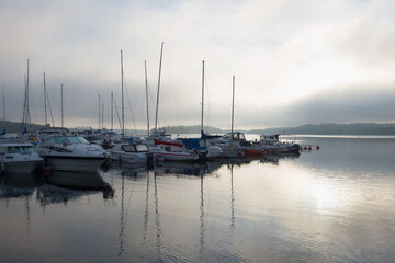 Fototapeta premium Summer foggy morning on Saimaa lake. Lappeenranta, Finland