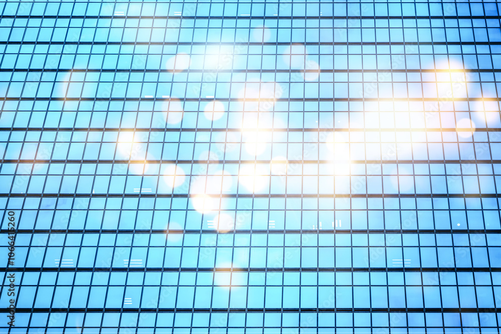 Poster an abstract image of a skyscraper with a grid pattern of windows, with blurred light reflecting off 