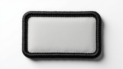 Realistic embroidered patch mockup featuring a rectangular, blank design with detailed stitching, ready for custom logos on a neutral background