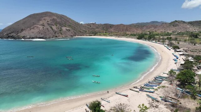Dreamy tropical island beach clear turquoise ocean tranquil travel video Mawun Beach Lombok Indonesia aerial drone footage 4k mavic 3