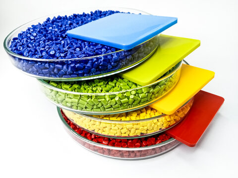 Plastisc masterbatch granules with colorchip isolated on a white background for industrial plastic product catalog profile photo designs