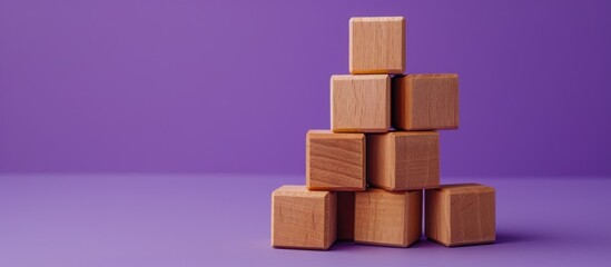 A symbolic financial planning message on wooden blocks against a purple backdrop serving as a visual representation with space for additional imagery