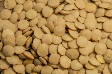 Dry lentils close up background