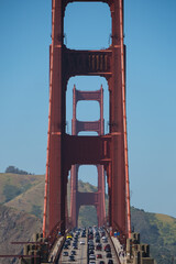 World famous red steel suspension bridge in San Francisco port entrance with Golden Gate State park...