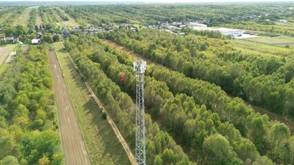 Cellular network transmitter tower in countryside