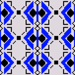 Obraz premium Blue chevron and black square arranged on a grey background. Abstract pattern of geometric shape and pixel art with concept of vintage, vivid, simplicity, and seamless for textile, print, and texture.