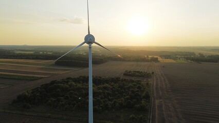 Scenic view of wind turbine in rural area