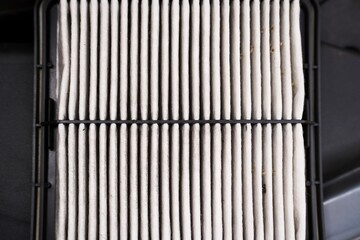 Cabin air filter with accumulated dirt